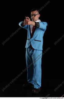 01 2018 01 MICHAL AGENT STANDING POSE WITH GUN